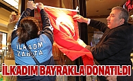 İLKADIM BAYRAKLA DONATILDI